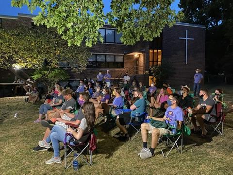 People participating in church service